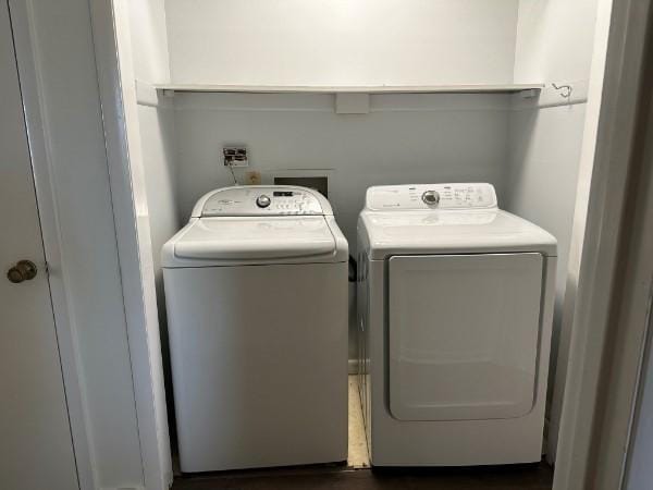 854 Todd Preis Dr, Nashville, TN 37221 - clothes washing area featuring laundry area and washing machine and dryer