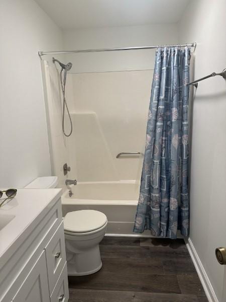 854 Todd Preis Dr, Nashville, TN 37221 - bathroom featuring baseboards, toilet, shower / tub combo with curtain, wood finished floors, and vanity