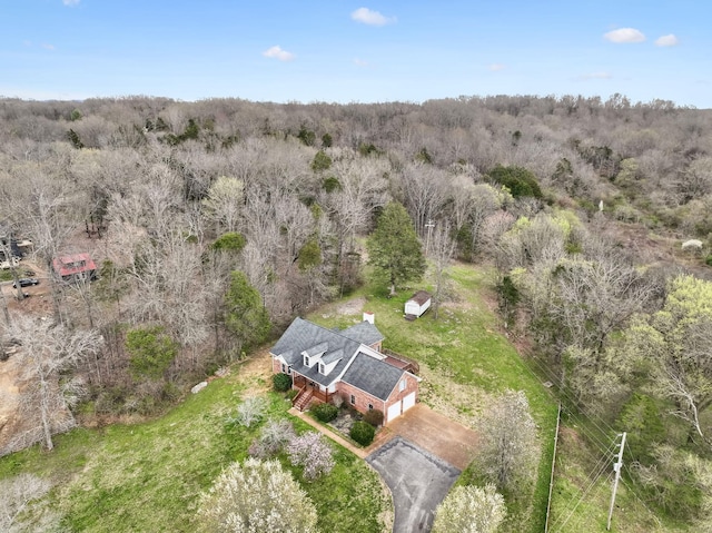 aerial view with a wooded view