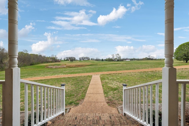 view of yard with a rural view