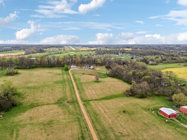 birds eye view of property featuring a rural view