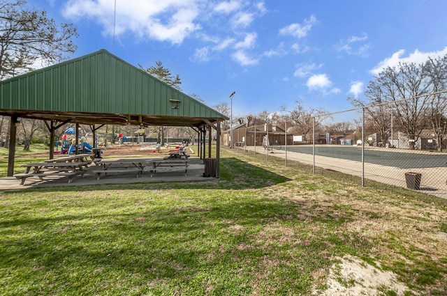 view of home's community featuring a gazebo, a yard, and fence