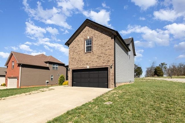 1033 Garner Hills Dr, Clarksville, TN 37042 - view of property exterior with concrete driveway, a yard, brick siding, and an attached garage