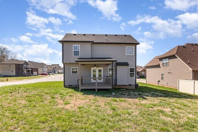 1033 Garner Hills Dr, Clarksville, TN 37042 - back of property with ceiling fan, a lawn, a residential view, and crawl space