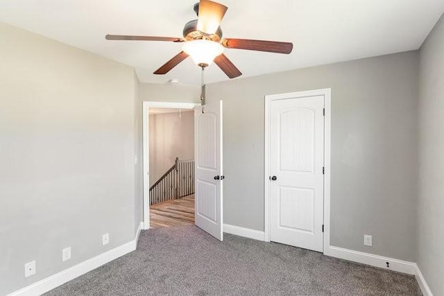 1033 Garner Hills Dr, Clarksville, TN 37042 - unfurnished bedroom featuring carpet, baseboards, and ceiling fan
