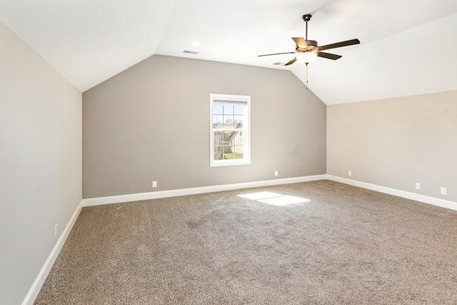 1033 Garner Hills Dr, Clarksville, TN 37042 - additional living space with visible vents, baseboards, lofted ceiling, carpet flooring, and a ceiling fan