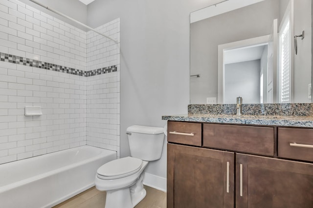 2003 Convent Pl Unit 6, Nashville, TN 37212 - bathroom featuring toilet, baseboards, vanity, and shower / washtub combination