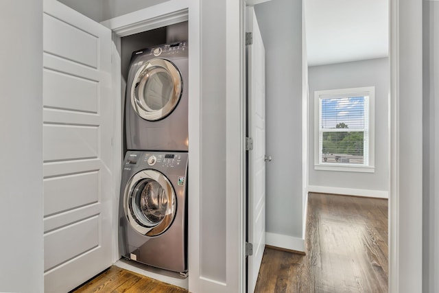 2003 Convent Pl Unit 6, Nashville, TN 37212 - laundry area with stacked washing machine and dryer, baseboards, and dark wood finished floors