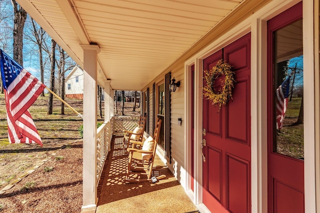 entrance to property featuring a porch