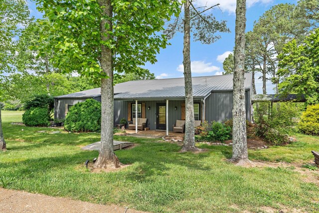 6923 Cross Keys Rd, College Grove, TN 37046 - ranch-style home featuring a front lawn, metal roof, and covered porch