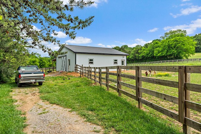 6923 Cross Keys Rd, College Grove, TN 37046 - view of yard with driveway, an outbuilding, a pole building, and fence