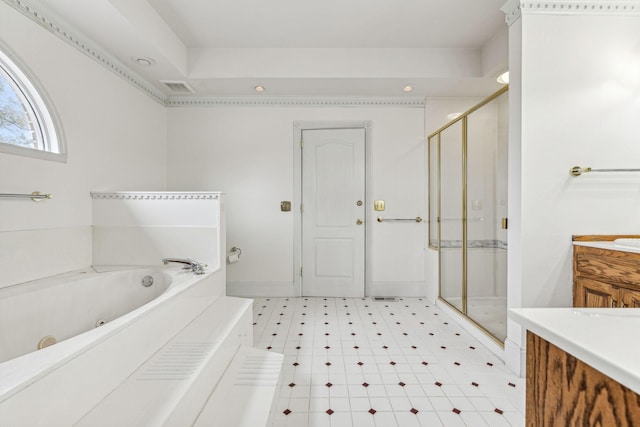 full bath with vanity, a jetted tub, visible vents, and a stall shower