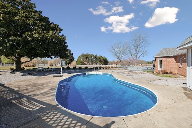 view of pool featuring a fenced in pool and a patio