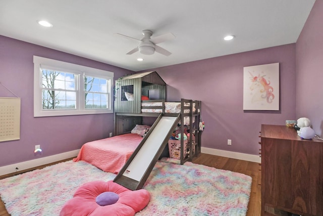bedroom featuring recessed lighting, wood finished floors, and baseboards