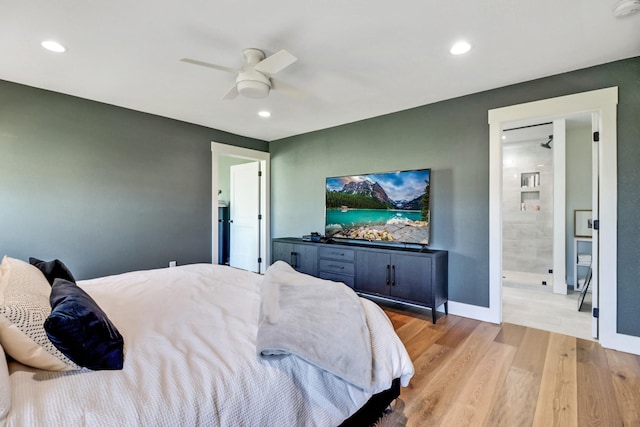 bedroom with light wood finished floors, baseboards, recessed lighting, ensuite bathroom, and a ceiling fan