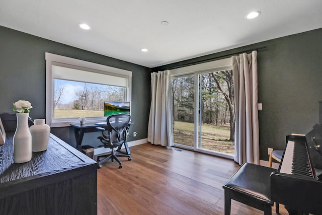 office space featuring recessed lighting, baseboards, and wood finished floors