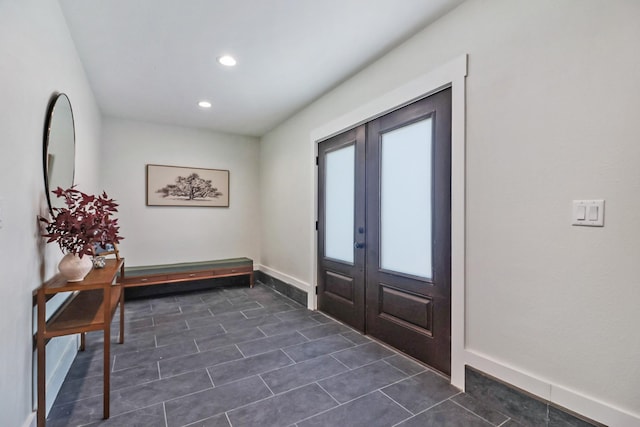 foyer entrance featuring recessed lighting, french doors, and baseboards