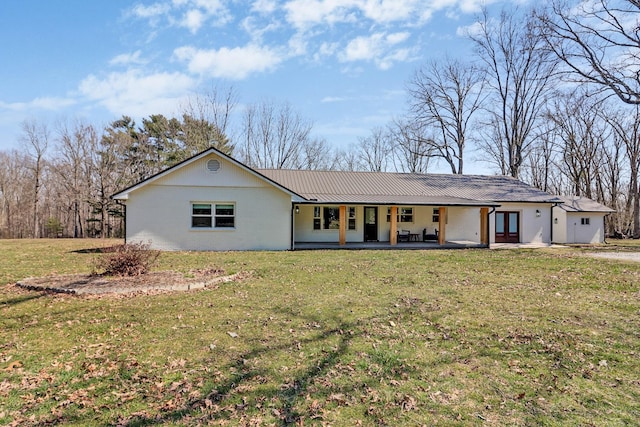 single story home featuring a front lawn