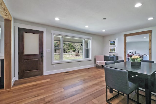 dining room featuring visible vents, recessed lighting, light wood-type flooring, and baseboards