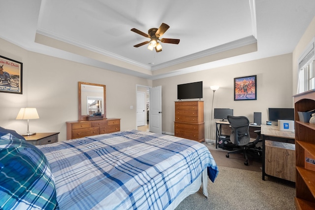 1561 Kestrel Dr, Clarksville, TN 37040 - bedroom featuring ceiling fan, a tray ceiling, ornamental molding, and carpet flooring