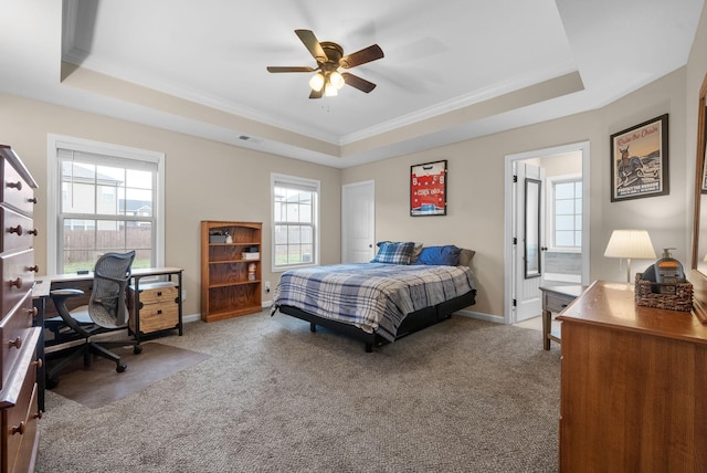 1561 Kestrel Dr, Clarksville, TN 37040 - carpeted bedroom featuring visible vents, ceiling fan, baseboards, a tray ceiling, and ornamental molding