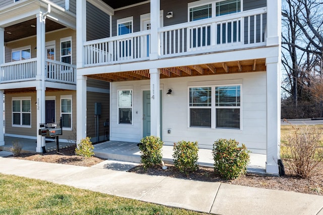 property entrance with covered porch