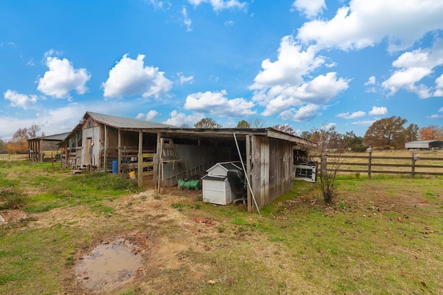 view of outdoor structure featuring an outbuilding and an exterior structure