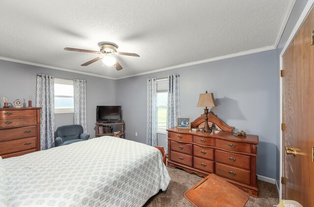 bedroom featuring baseboards, ceiling fan, ornamental molding, a textured ceiling, and carpet flooring