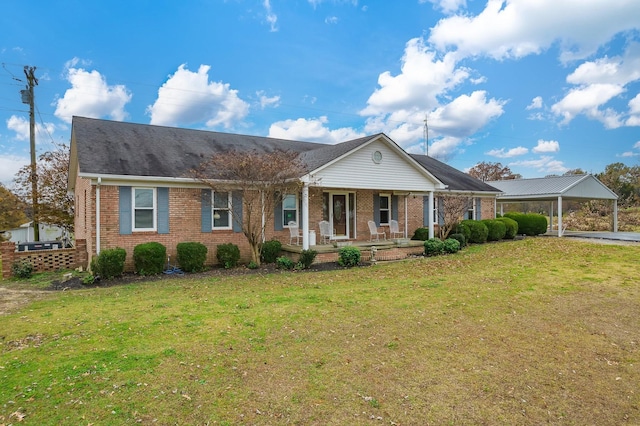 single story home with brick siding, an attached carport, a porch, and a front yard