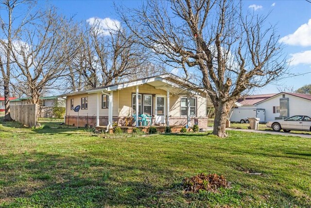 112 Shasteen St, Estill Springs, TN 37330 - view of front facade with a front lawn