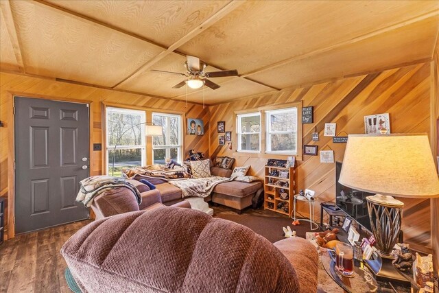 112 Shasteen St, Estill Springs, TN 37330 - living room featuring a ceiling fan, wooden walls, and wood finished floors