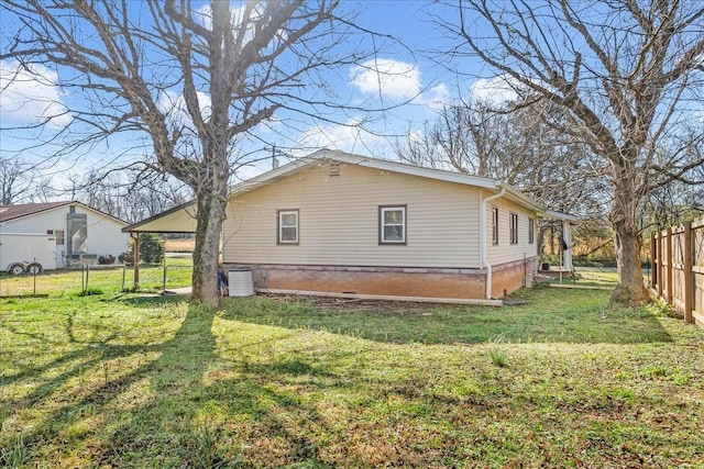 112 Shasteen St, Estill Springs, TN 37330 - view of side of home featuring fence and a lawn