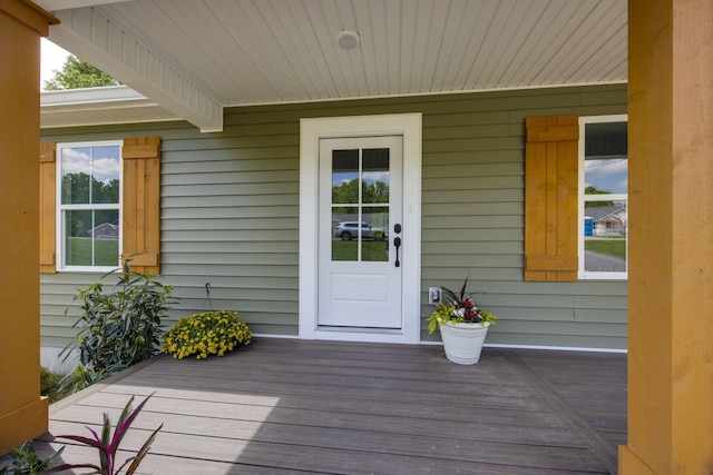 doorway to property featuring a porch