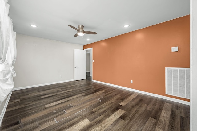 empty room with baseboards, visible vents, recessed lighting, dark wood-style flooring, and ceiling fan