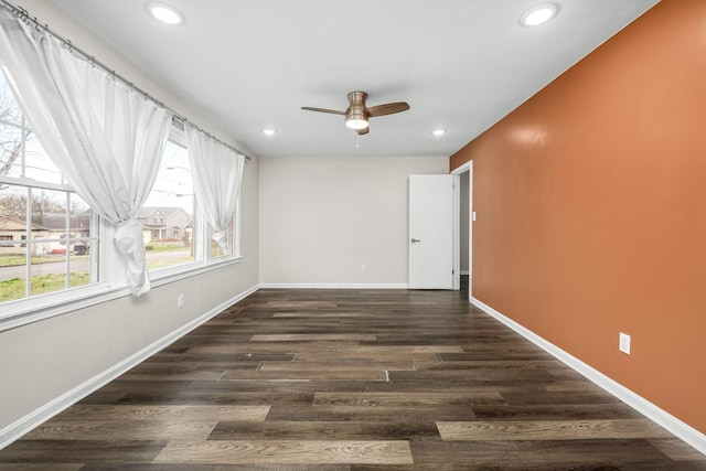 spare room with recessed lighting, baseboards, dark wood-type flooring, and ceiling fan