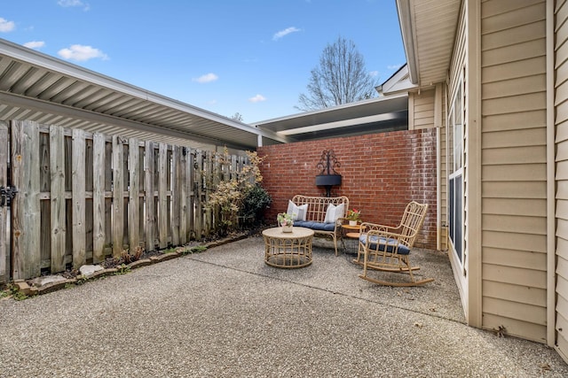 view of patio with fence