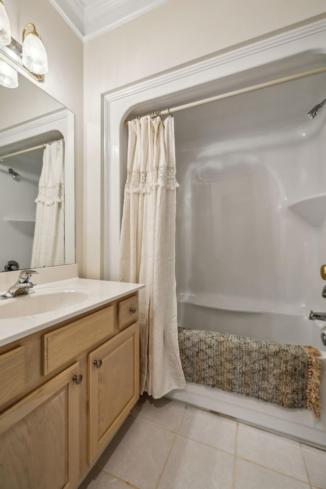 bathroom featuring tile patterned flooring, vanity, crown molding, and shower / tub combo