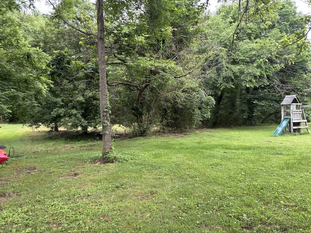 502 Twomey Rd, Centerville, TN 37033 - view of grassy yard with a playground