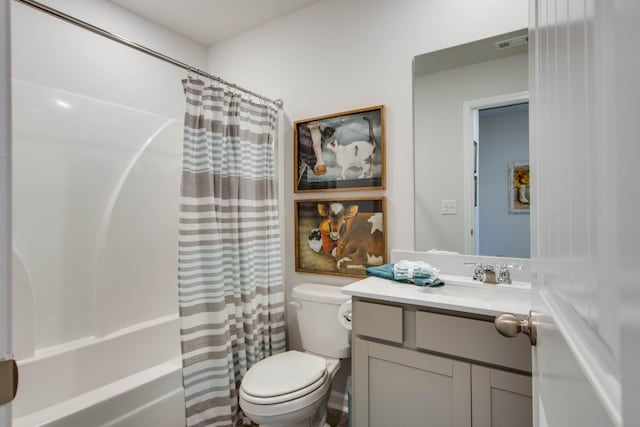 full bathroom featuring shower / tub combo with curtain, visible vents, toilet, and vanity