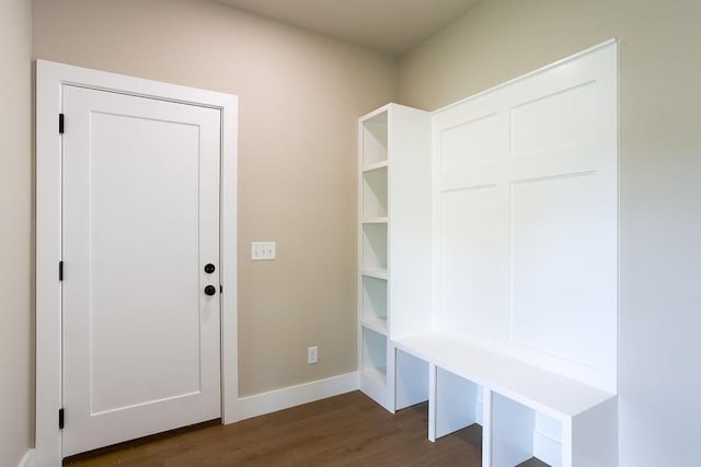 mudroom with baseboards and dark wood-style floors