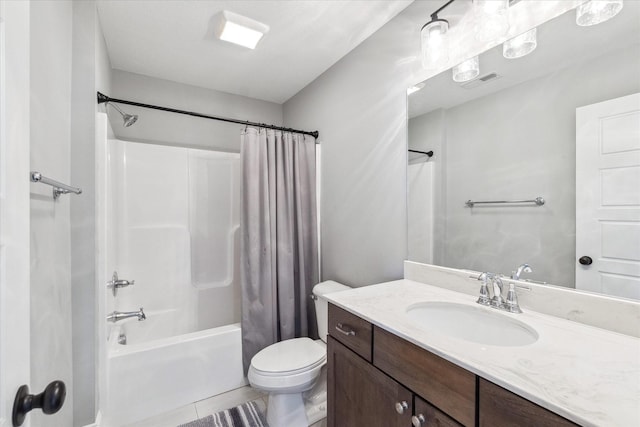 bathroom with vanity, visible vents, shower / bath combo, tile patterned flooring, and toilet