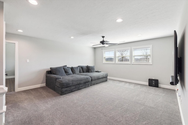 carpeted living room featuring recessed lighting, baseboards, and ceiling fan
