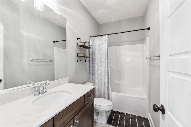 full bathroom with vanity, shower / bath combination with curtain, and toilet