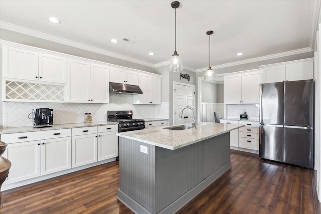 kitchen featuring under cabinet range hood, white cabinets, appliances with stainless steel finishes, and a sink