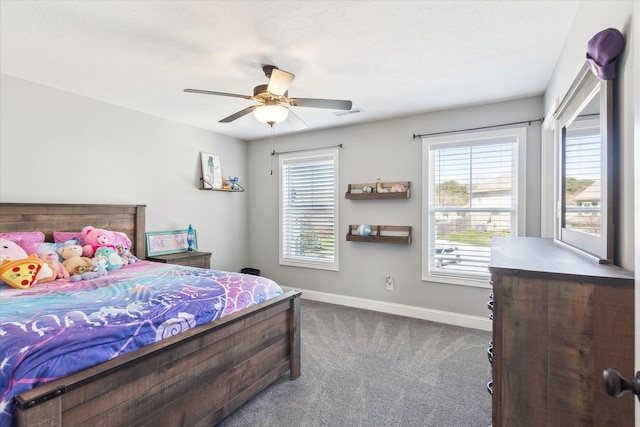 bedroom featuring visible vents, carpet, baseboards, and ceiling fan