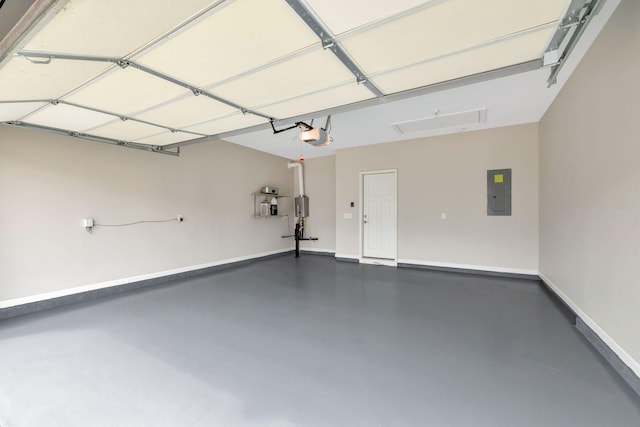 garage featuring baseboards, a garage door opener, and electric panel