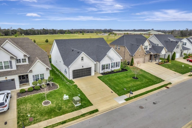birds eye view of property with a residential view