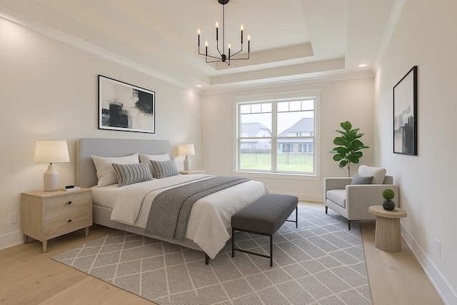 1251 Payton Ln, Gallatin, TN 37066 - bedroom featuring a chandelier, light wood-type flooring, baseboards, a tray ceiling, and crown molding