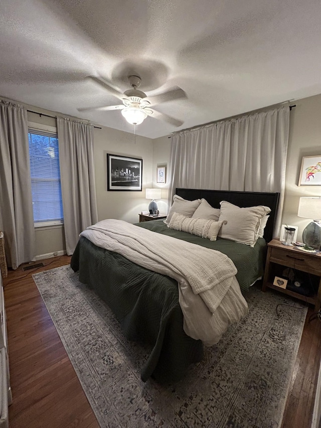 143 39th Ave N, Nashville, TN 37209 - bedroom featuring ceiling fan, wood finished floors, and a textured ceiling