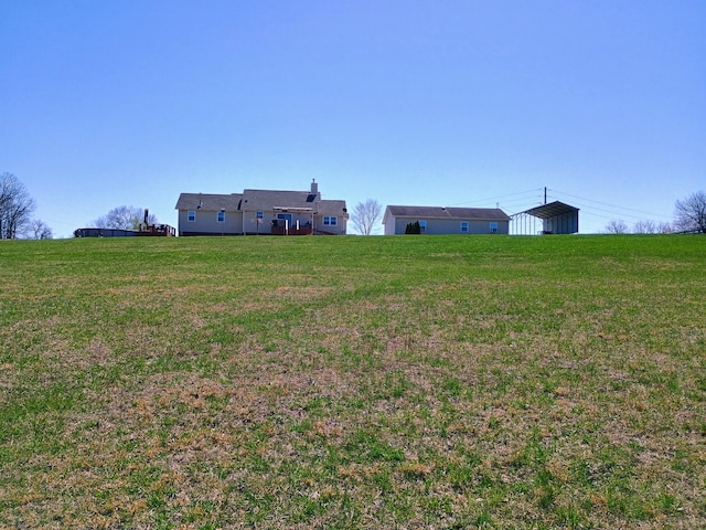view of yard featuring a carport